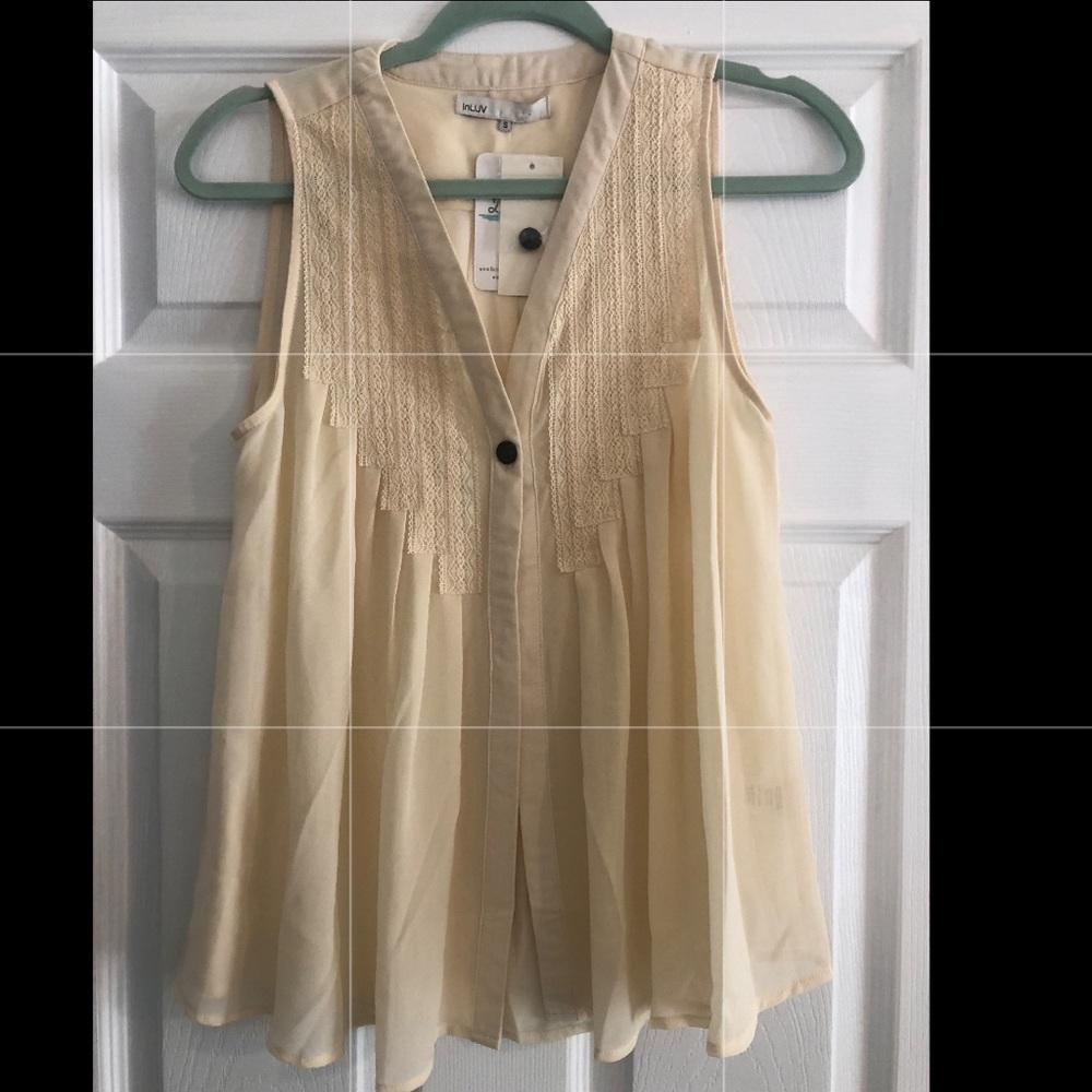 In love, size small, beige tank